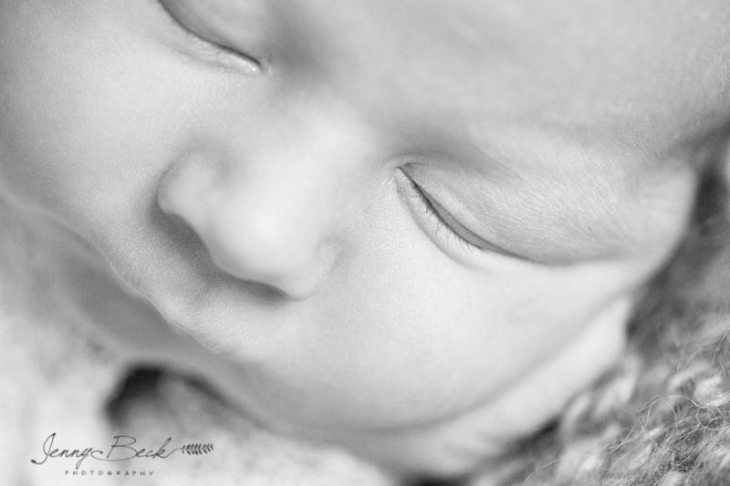 westerville ohio newborn photographer - black and white close up photograph of baby's face