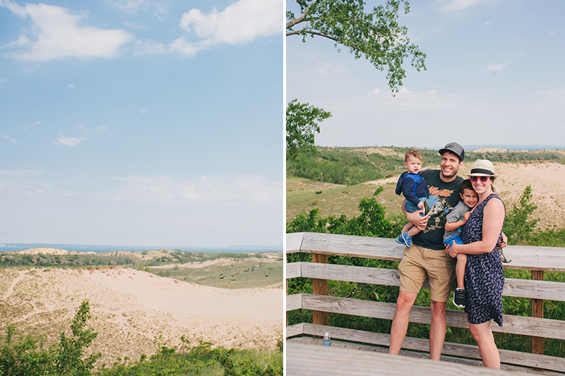 young family smiling on the sleeping bear dunes scenic drive