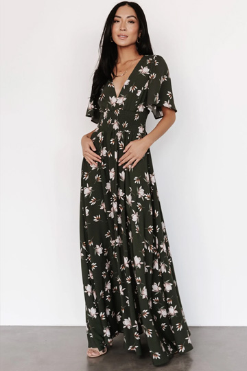 woman wearing a black maxi with white floral
