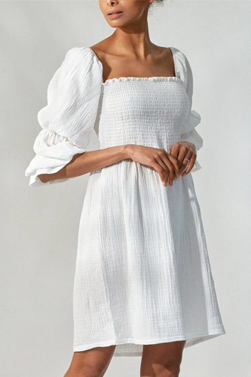woman wearing white cotton dress