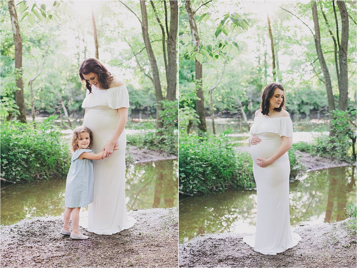 new albany ohio maternity photographer - pregnant mom in white dress hugging 2 year old daughter in the woods