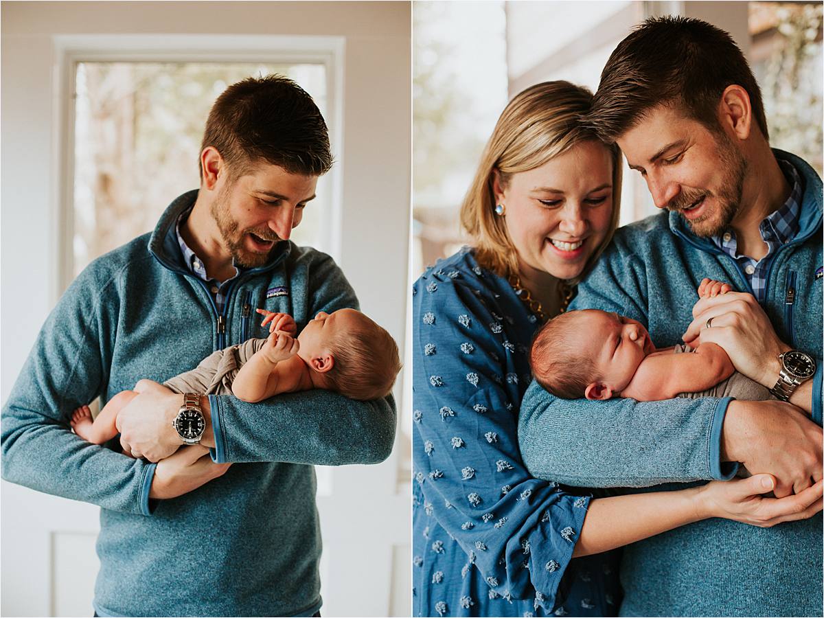 westerville ohio minimal newborn photography - mom and dad holding newborn baby looking down and smiling at him