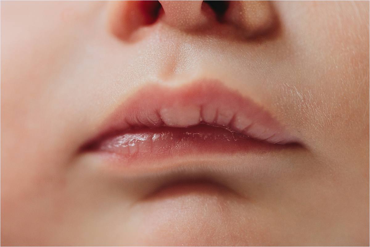 close up of newborn lips