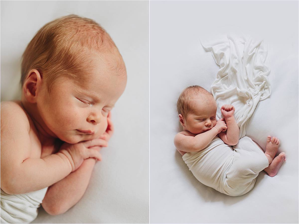 new baby lying on side in white wrap on white backdrop